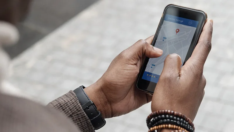 Local Business SEO Tips and Tactics 2 holding smartphone