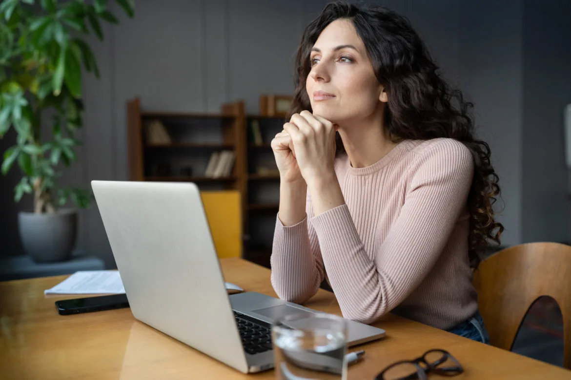Marketing Investment for Startups: 8 Effective Tips 1 woman thinking at laptop