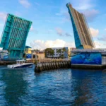 Website Design for the Marine Industry 1 boat under bridge in fort lauderdale heading to marina